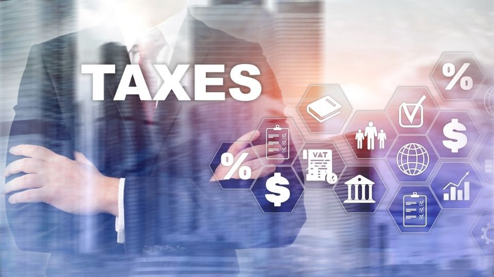 (In the image it can be seen a person is handling his tax and VAT matters in a digital way) VAT on Digital Services – What VAT is Due