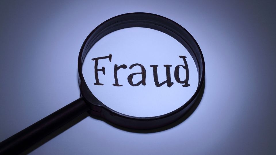 (In the image a magnifying glass can be seen on Fraud on cheques) Check fraud How it works and tips to protect yourself