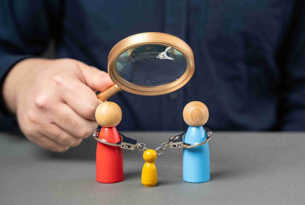 In the image a man can be seen detecting fraud and trying to prevent any fraud